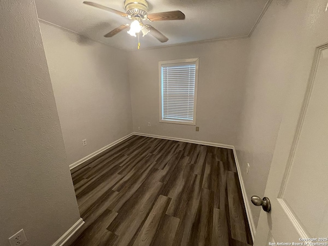 2025 Texas, San Antonio, TX 78228 - unfurnished room featuring a ceiling fan and dark wood-type flooring