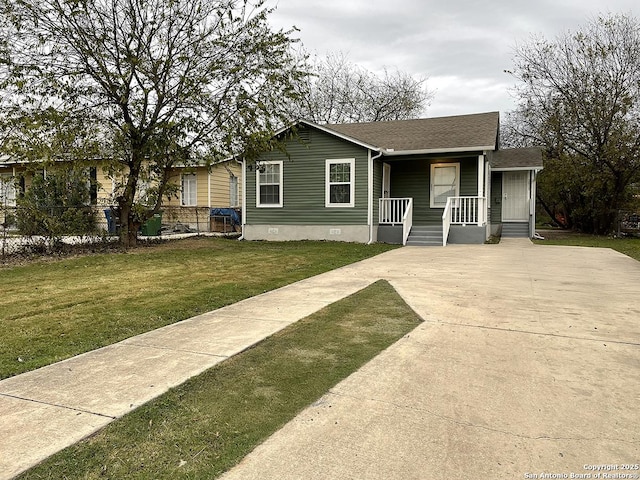 2025 Texas, San Antonio, TX 78228 - view of front of property featuring a porch, crawl space, concrete driveway, a front lawn, and a shingled roof