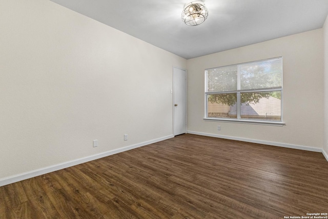 3934 Knollhaven, San Antonio, TX 78247 - empty room with baseboards and dark wood finished floors