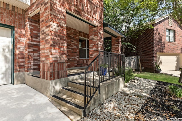 3934 Knollhaven, San Antonio, TX 78247 - doorway to property featuring brick siding and driveway