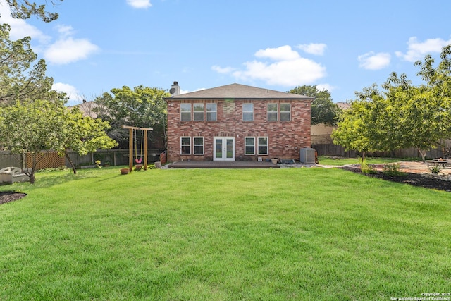 3934 Knollhaven, San Antonio, TX 78247 - back of property with french doors, a chimney, a fenced backyard, and brick siding