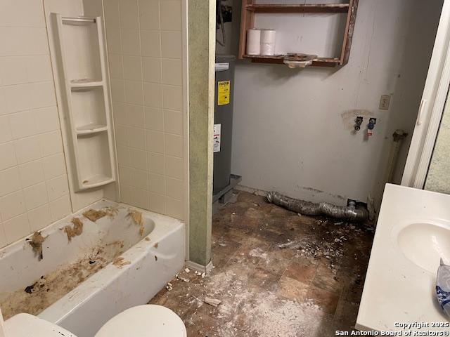 12315 Royal Grn, Conroe, TX 77303 - bathroom with a tub to relax in, electric water heater, a shower, and vanity