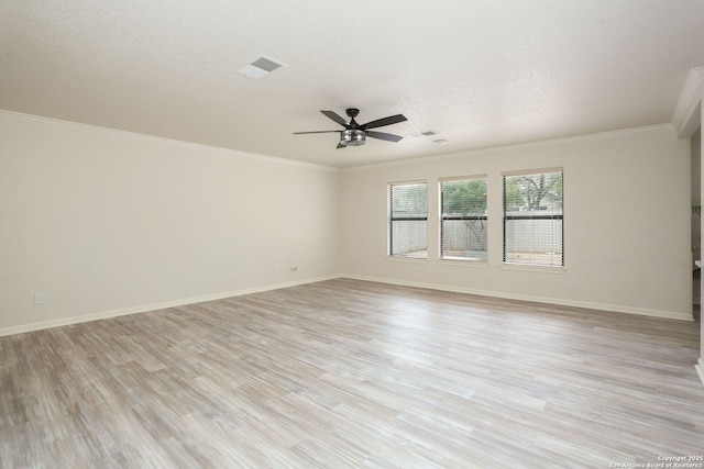 16063 Walnut Crk, San Antonio, TX 78247 - spare room with crown molding, light wood-style flooring, and ceiling fan