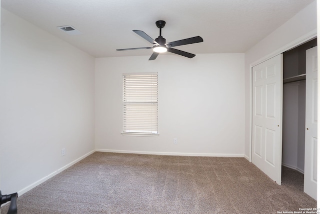 16063 Walnut Crk, San Antonio, TX 78247 - unfurnished bedroom featuring carpet, ceiling fan, and a closet