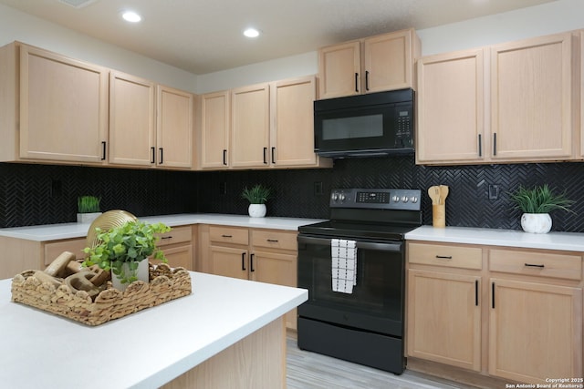 16063 Walnut Crk, San Antonio, TX 78247 - kitchen with light brown cabinets, black appliances, light countertops, and recessed lighting