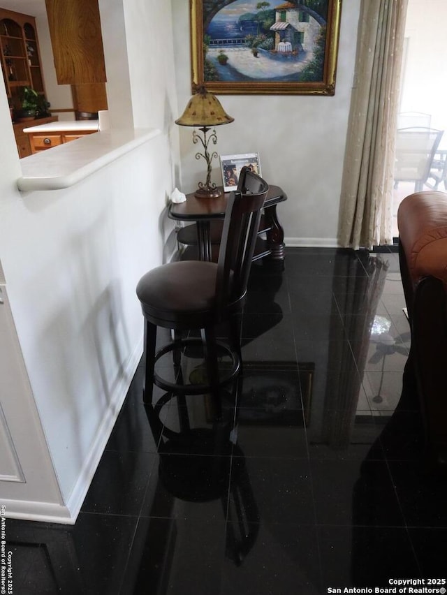 6035 Royal Breeze, San Antonio, TX 78239 - dining room featuring granite tiled floors and baseboards