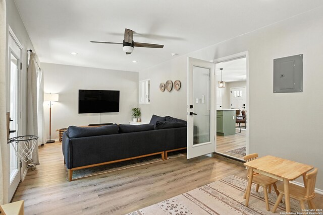 619 Olney Dr, San Antonio, TX 78209 - living area featuring electric panel, light wood finished floors, a ceiling fan, and recessed lighting