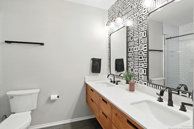 619 Olney Dr, San Antonio, TX 78209 - bathroom featuring double vanity and a tile shower
