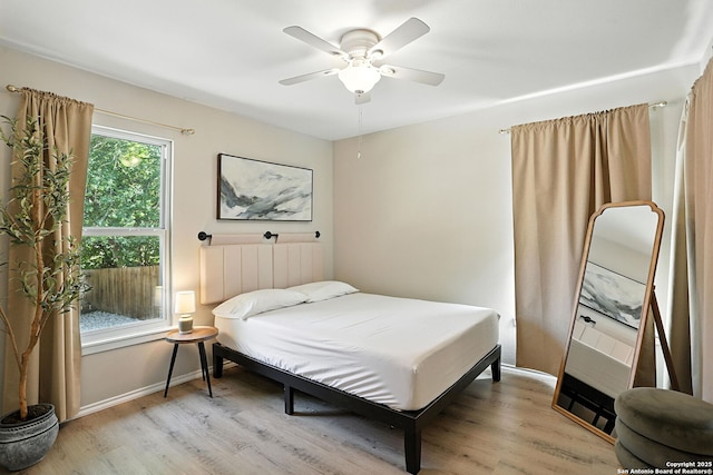 619 Olney Dr, San Antonio, TX 78209 - bedroom featuring light wood finished floors and a ceiling fan