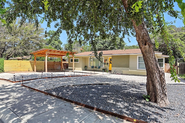 619 Olney Dr, San Antonio, TX 78209 - view of front of house featuring a pergola, a patio, and brick siding