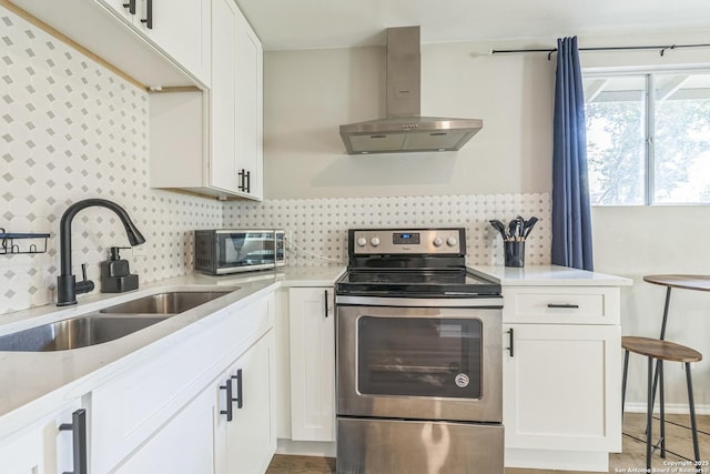 619 Olney Dr, San Antonio, TX 78209 - kitchen with electric range, ventilation hood, backsplash, and white cabinetry