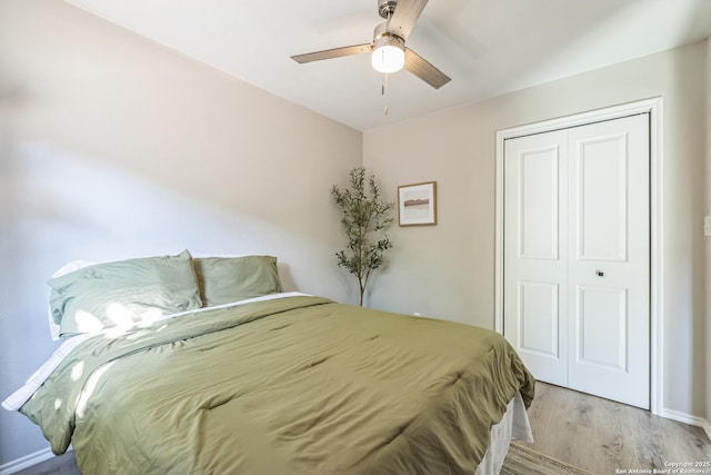 619 Olney Dr, San Antonio, TX 78209 - bedroom with light wood-type flooring, a closet, and a ceiling fan