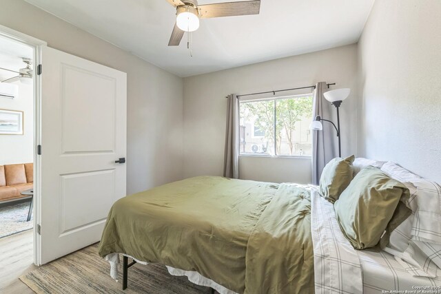 619 Olney Dr, San Antonio, TX 78209 - bedroom featuring light wood finished floors and a ceiling fan