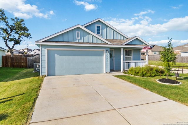 5331 Fair Moon, Bulverde, TX 78163 - view of front of home with board and batten siding, covered porch, a garage, and concrete driveway