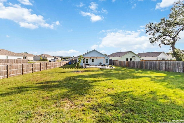 5331 Fair Moon, Bulverde, TX 78163 - fenced backyard featuring a patio and a residential view
