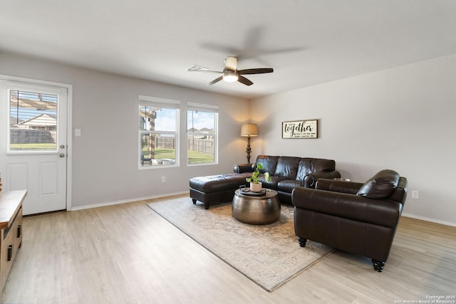 5331 Fair Moon, Bulverde, TX 78163 - living area featuring a ceiling fan, light wood finished floors, and plenty of natural light