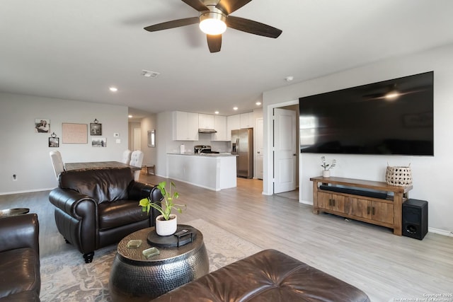 5331 Fair Moon, Bulverde, TX 78163 - living area with light wood-style flooring, ceiling fan, and recessed lighting