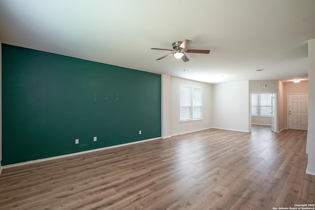 27422 Bighorn Sheep, Boerne, TX 78015 - unfurnished room with ceiling fan and wood finished floors