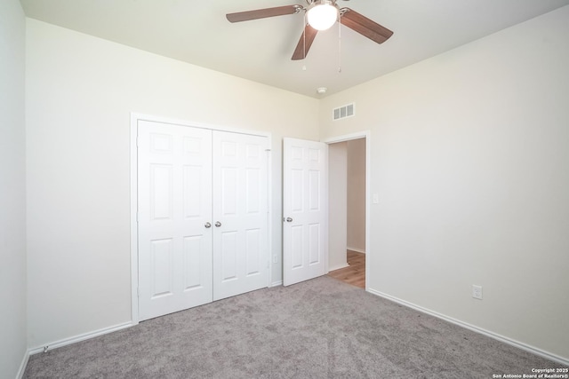 27422 Bighorn Sheep, Boerne, TX 78015 - unfurnished bedroom featuring carpet, a closet, and a ceiling fan