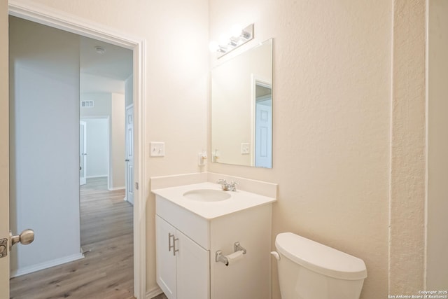 27422 Bighorn Sheep, Boerne, TX 78015 - bathroom featuring vanity and wood finished floors