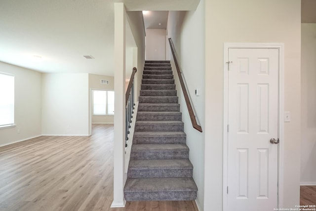 27422 Bighorn Sheep, Boerne, TX 78015 - stairway with wood finished floors and baseboards