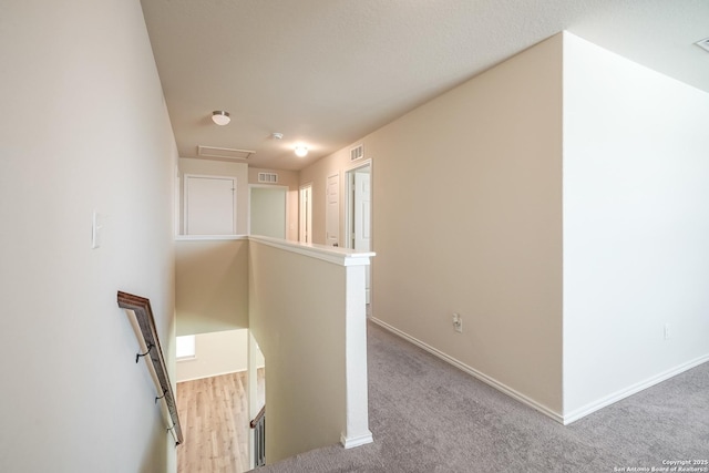 27422 Bighorn Sheep, Boerne, TX 78015 - hall with an upstairs landing and carpet