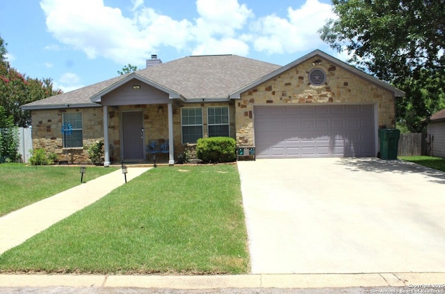 105 Yucca, Jourdanton, TX 78026 - ranch-style house featuring stone siding, an attached garage, driveway, a chimney, and a shingled roof