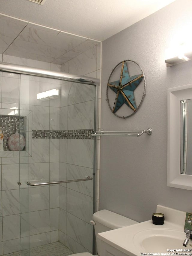 105 Yucca, Jourdanton, TX 78026 - full bath with vanity and a shower stall