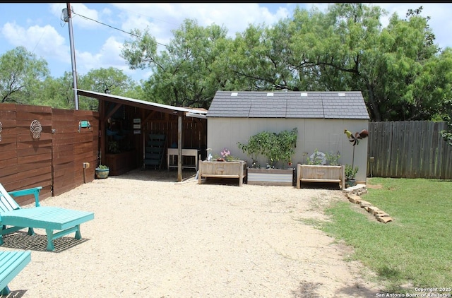105 Yucca, Jourdanton, TX 78026 - view of patio with an outbuilding