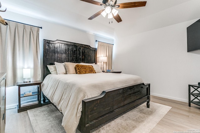 8030 Chanting, San Antonio, TX 78223 - bedroom featuring light wood finished floors and a ceiling fan