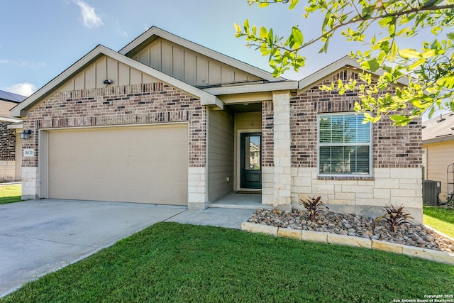 8030 Chanting, San Antonio, TX 78223 - view of front of house featuring board and batten siding, brick siding, a garage, driveway, and a front lawn