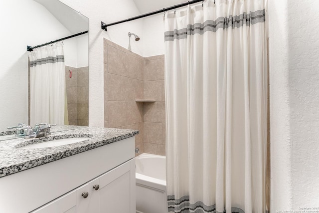 8030 Chanting, San Antonio, TX 78223 - bathroom featuring vanity, shower / tub combo, and a textured wall