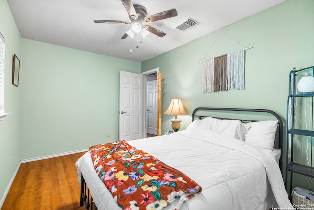 9830 Lauren Mist, San Antonio, TX 78251 - bedroom featuring wood finished floors and ceiling fan