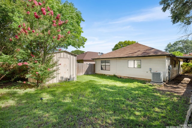 9830 Lauren Mist, San Antonio, TX 78251 - back of property featuring a storage unit and roof with shingles