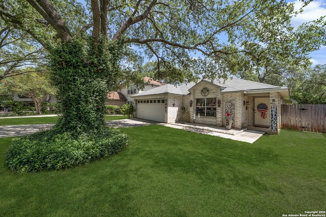 8810 Sebec Cir, San Antonio, TX 78250 - view of front of home featuring a garage, concrete driveway, and brick siding