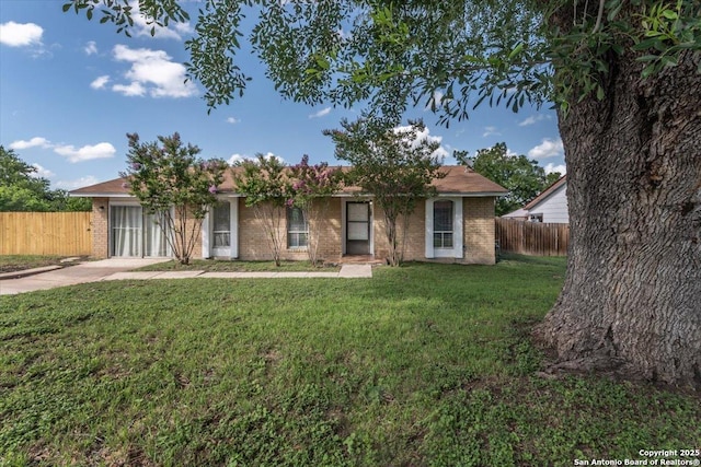 142 Meadow, Converse, TX 78109 - view of front of house with brick siding and driveway
