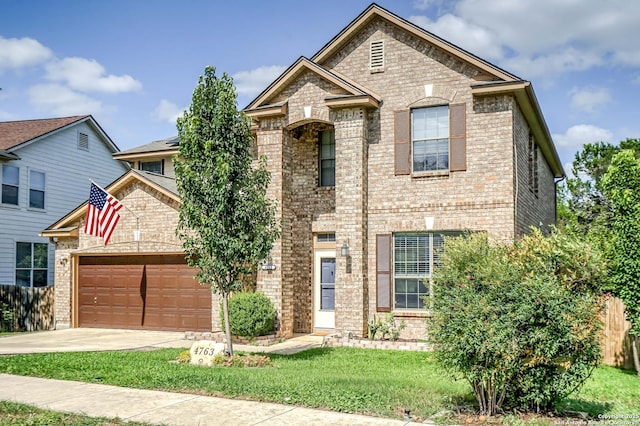 4763 Bending Grv, San Antonio, TX 78259 - view of front of home featuring brick siding, concrete driveway, a garage, and a front lawn