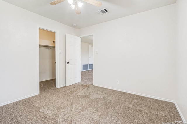 4763 Bending Grv, San Antonio, TX 78259 - unfurnished bedroom with light colored carpet, a walk in closet, a closet, and ceiling fan
