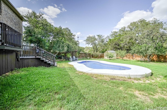4763 Bending Grv, San Antonio, TX 78259 - view of swimming pool featuring stairway, a fenced backyard, a storage shed, and view of scattered trees