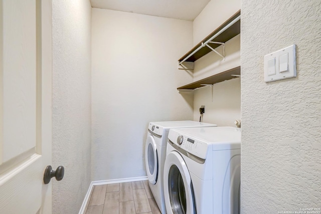 4763 Bending Grv, San Antonio, TX 78259 - washroom with independent washer and dryer, light wood finished floors, and a textured wall