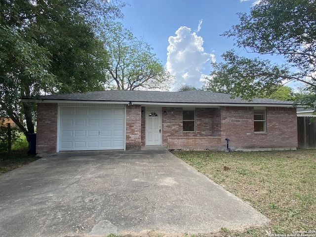 305 Osage, Refugio, TX 78377 - single story home with a garage, driveway, and brick siding