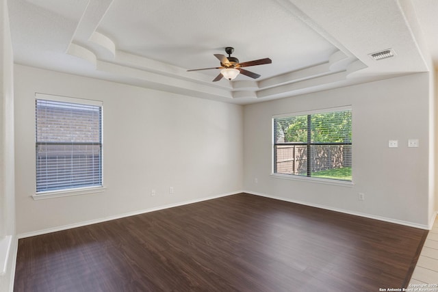 5614 Cross Pond, San Antonio, TX 78249 - unfurnished room with a raised ceiling, ceiling fan, and wood finished floors