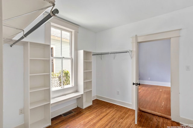 110 Vitra, San Antonio, TX 78210 - spacious closet with wood-type flooring