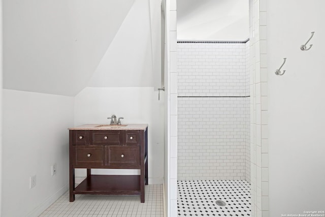 110 Vitra, San Antonio, TX 78210 - bathroom with a tile shower, vanity, and vaulted ceiling