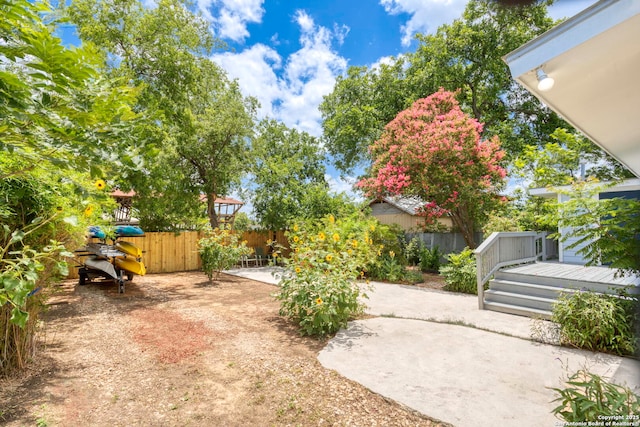 110 Vitra, San Antonio, TX 78210 - fenced backyard featuring a patio and a wooden deck