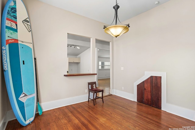 110 Vitra, San Antonio, TX 78210 - empty room featuring wood finished floors and a smoke detector