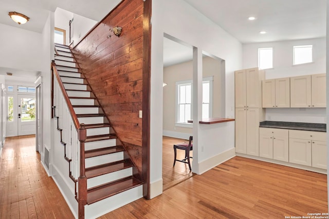 110 Vitra, San Antonio, TX 78210 - staircase with wood finished floors and recessed lighting