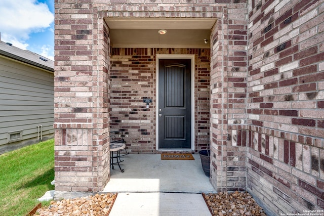 6583 Runaway, Converse, TX 78109 - doorway to property featuring brick siding