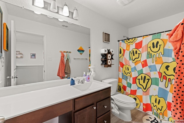 6583 Runaway, Converse, TX 78109 - bathroom with vanity, wood finished floors, and a shower with curtain