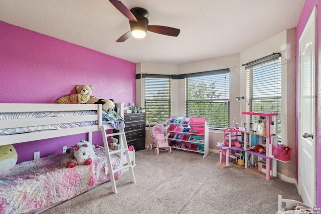 630 Oxalis, San Antonio, TX 78260 - carpeted bedroom featuring ceiling fan and a textured wall